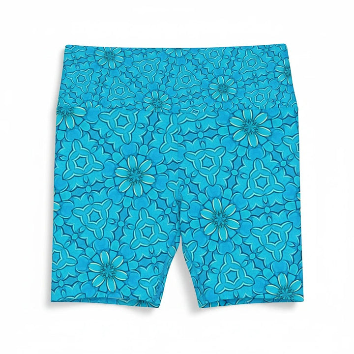 Sea Dragon Dreams turquoise workout shorts featuring a groovy floral pattern, made from lightweight polyester.