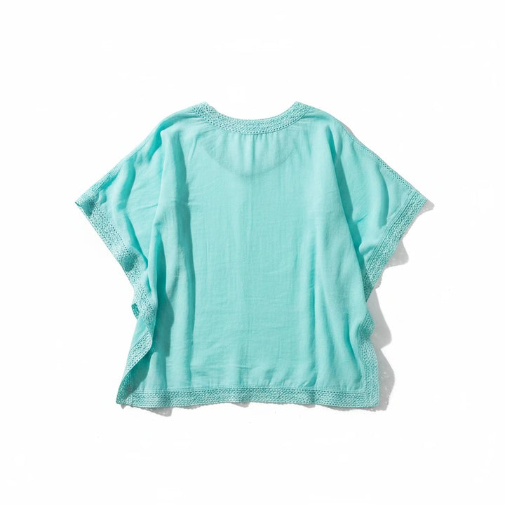 Sea Dragon Dreams turquoise lace beach cover-up with a breezy relaxed fit and delicate trim details