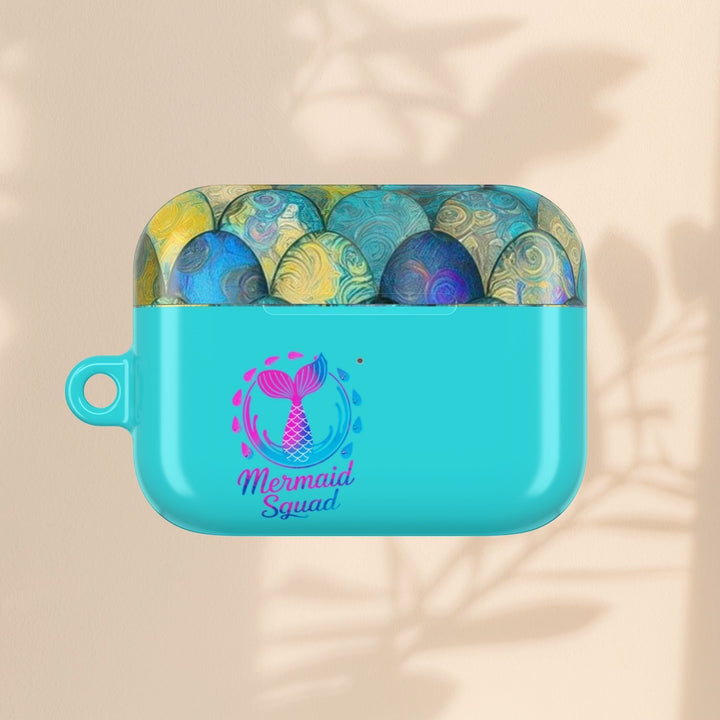 Sea Dragon Dreams turquoise AirPods case with a mermaid tail design and Mermaid Squad text on a light background.