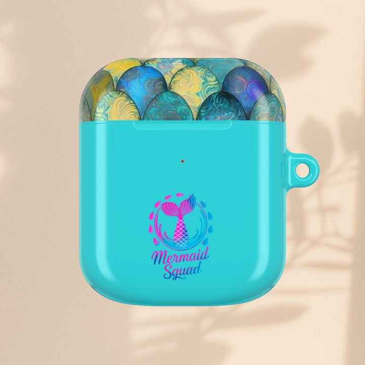 Sea Dragon Dreams turquoise AirPods case featuring a mermaid tail design and Mermaid Squad text with scale pattern lid