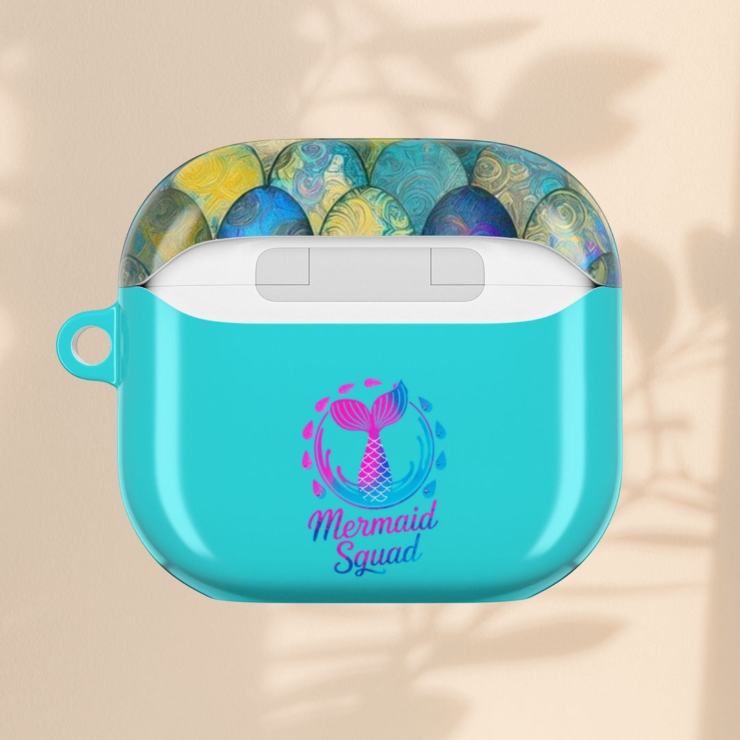 Sea Dragon Dreams turquoise AirPods case featuring a mermaid tail design and Mermaid Squad text on a hard shell.