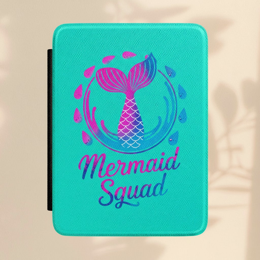 Sea Dragon Dreams turquoise Kindle case with a mermaid tail graphic and Mermaid Squad text in a shimmering design.