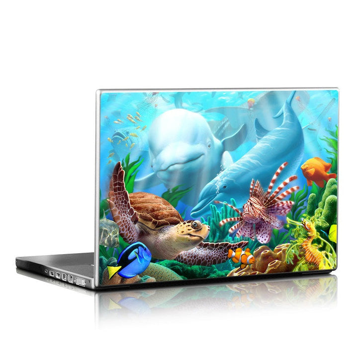 Sea Dragon Dreams laptop skin featuring a vibrant underwater coral reef scene with dolphins, a sea turtle, and fish.