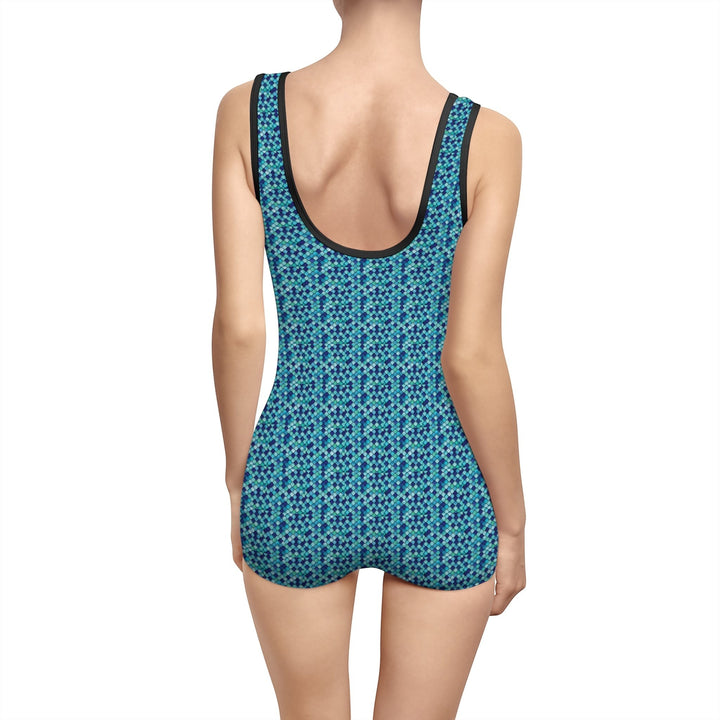 Sea Dragon Dreams vintage style swimsuit with blue mermaid scale pattern and deep U-shape back cut on a woman