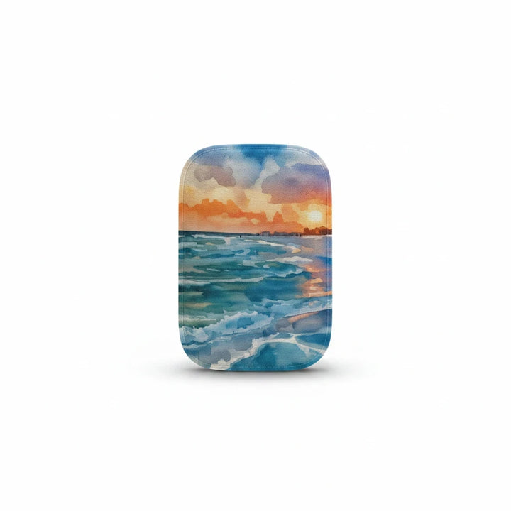 Sea Dragon Dreams Kindle case featuring a vibrant watercolor sunset over a blue ocean seascape on a smooth PU cover.