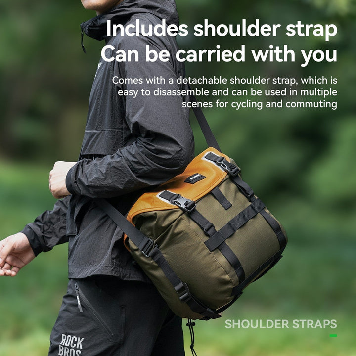 Sea Dragon Dreams 24L waterproof bike bag in olive green and brown, worn as a shoulder bag with a detachable strap.