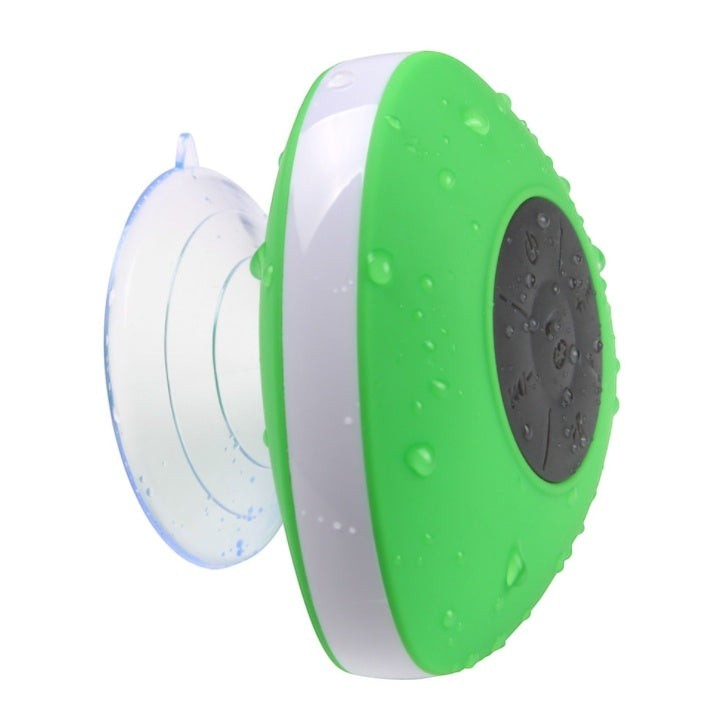 Sea Dragon Dreams waterproof green and white Bluetooth shower speaker with a suction cup for bathroom use