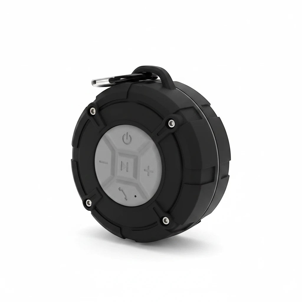 Sea Dragon Dreams black and grey IPX7 waterproof Bluetooth speaker with a rugged design and integrated carry buckle.