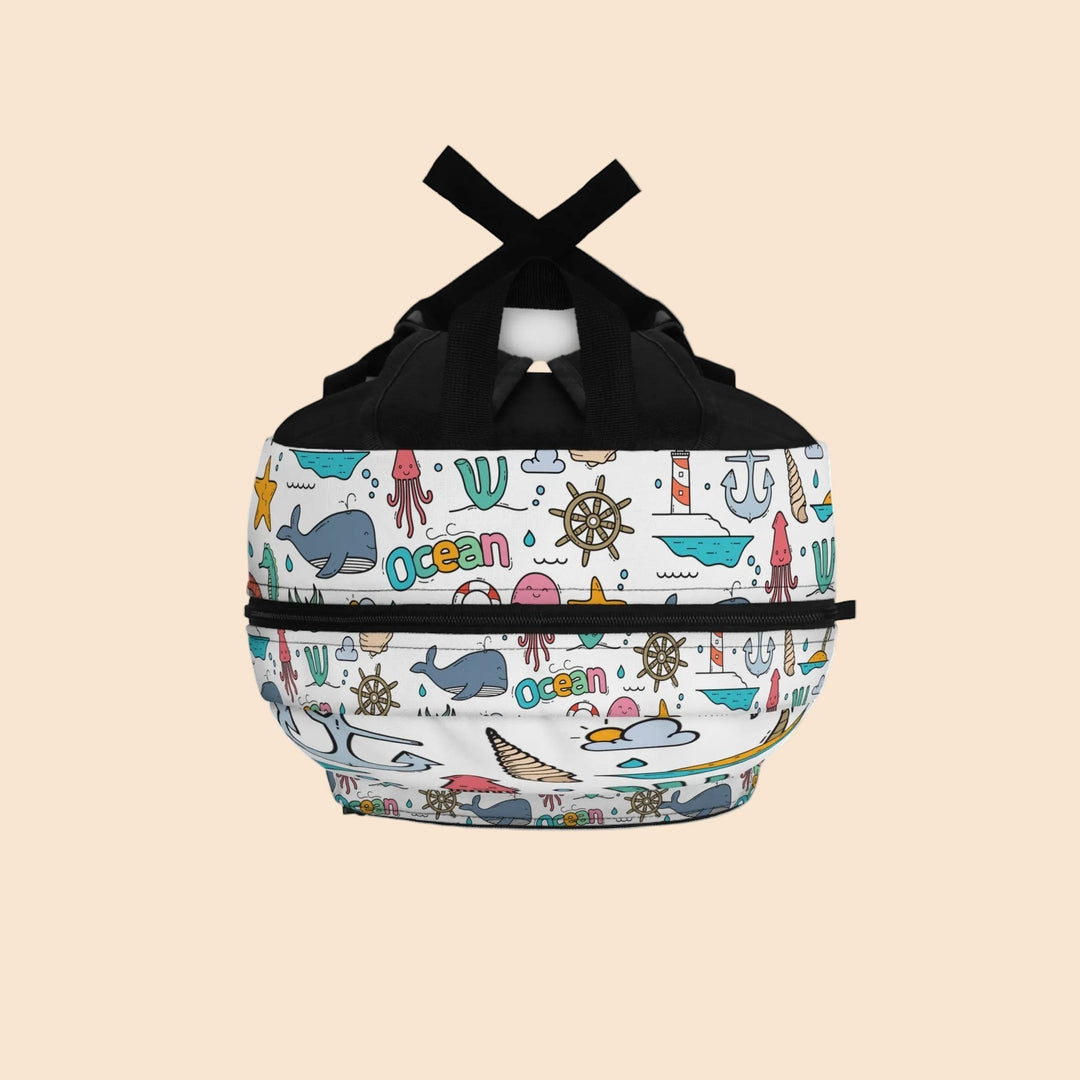 Sea Dragon Dreams whimsical ocean-themed polyester backpack with colorful whale, anchor, and marine motif print.