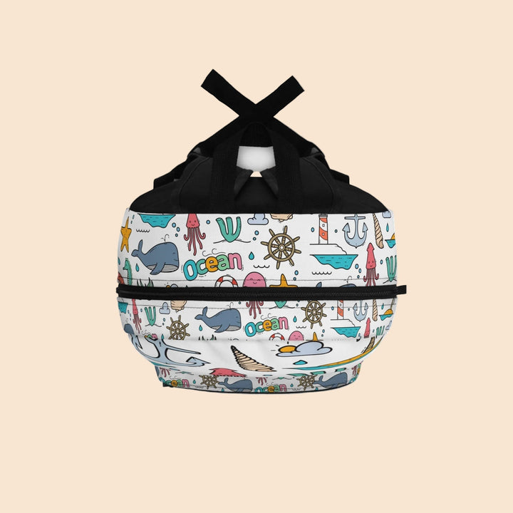 Sea Dragon Dreams whimsical ocean-themed polyester backpack with colorful whale, anchor, and marine motif print.