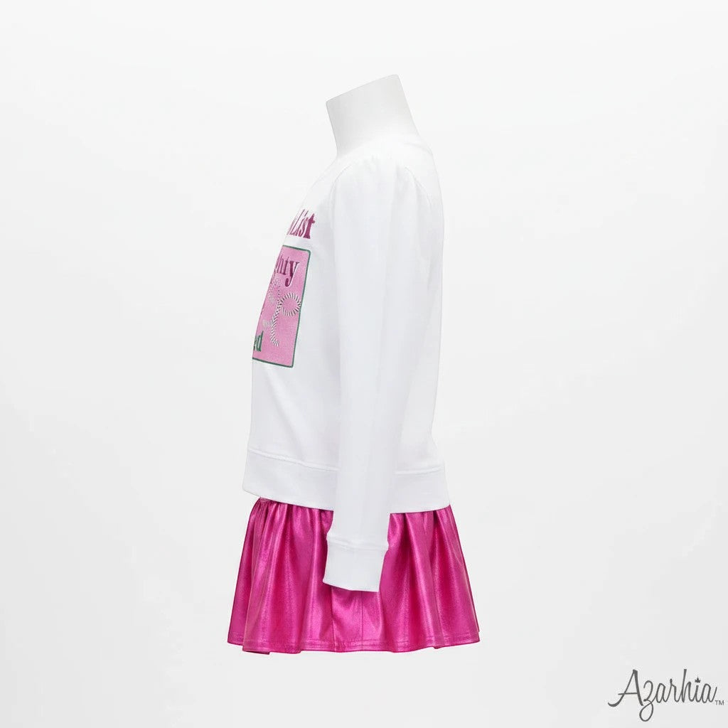 Sea Dragon Dreams white long-sleeve sweatshirt with Santa List graphic paired with a metallic pink skirt