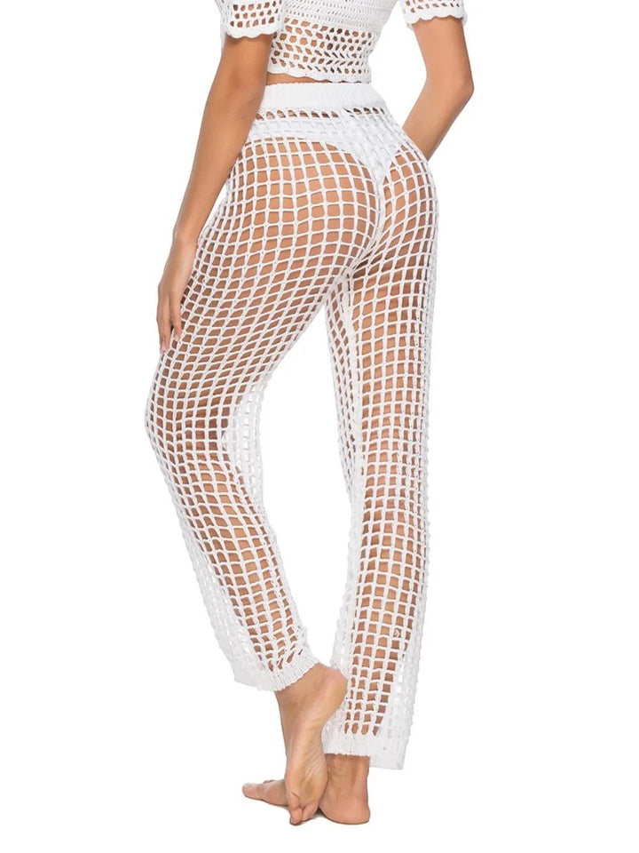 Sea Dragon Dreams white high-waisted crochet swim pants with a sheer net design and cutout details