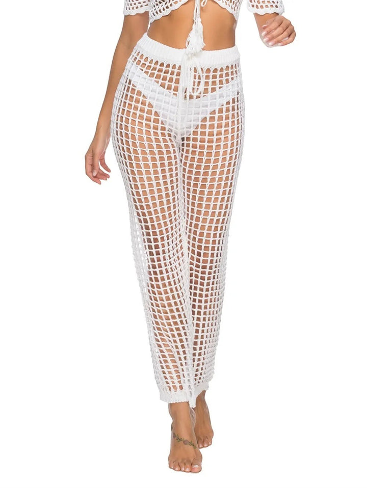 Sea Dragon Dreams white high-waisted crochet swim pants with a sheer net design and drawstring waist