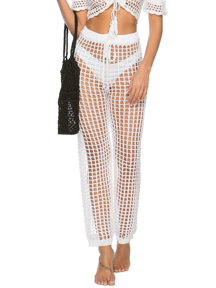 Sea Dragon Dreams white high-waisted crochet swim pants with a drawstring waist and open-knit mesh design.