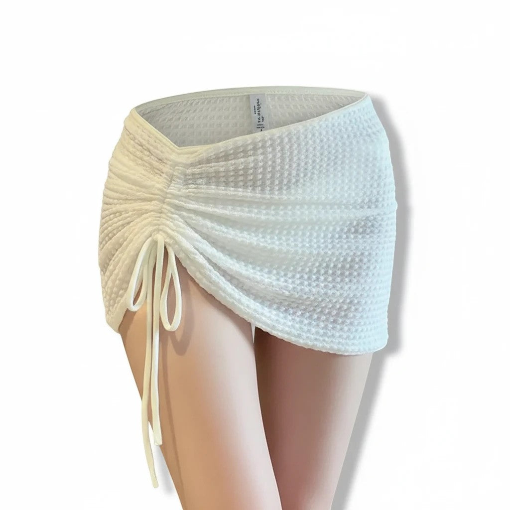 Sea Dragon Dreams white textured drawstring bikini skirt with adjustable side ruching for a mermaidcore beach look