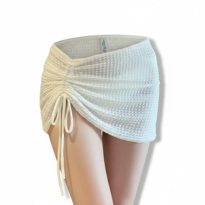 Sea Dragon Dreams white textured drawstring bikini skirt with adjustable side ruching for a mermaidcore beach look