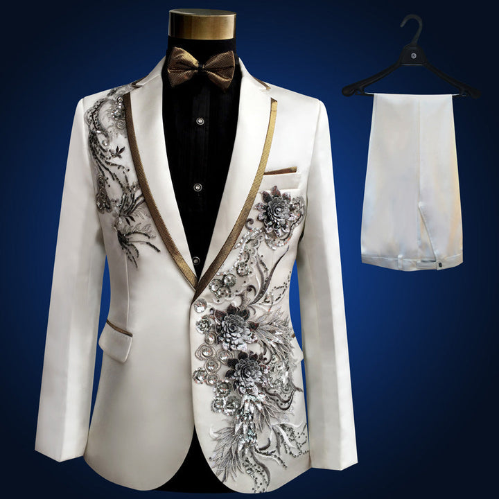 Sea Dragon Dreams white slim-fit tuxedo blazer with intricate silver floral embroidery and shimmering paillettes