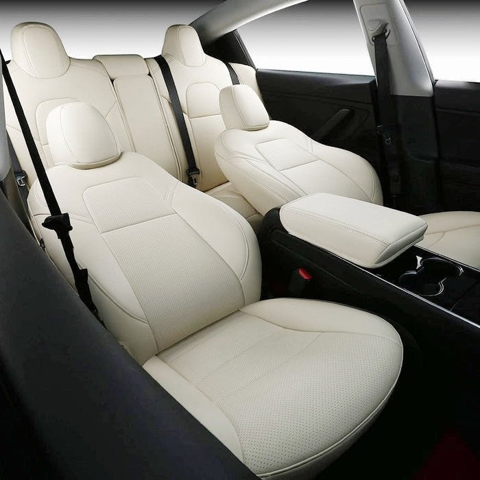 Sea Dragon Dreams white leather seat covers installed in a Tesla Model 3 or Model Y interior for a premium look.