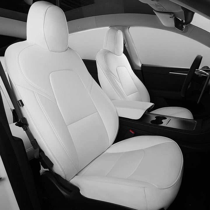 Sea Dragon Dreams white leather seat covers installed in a Tesla Model 3 or Model Y interior for a premium look.