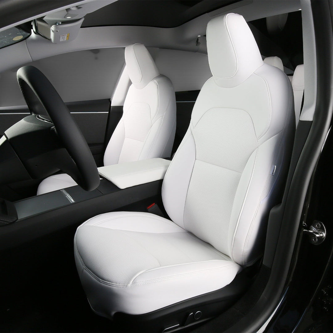 Sea Dragon Dreams white leather seat covers installed in a Tesla Model 3 Highland or Model Y interior
