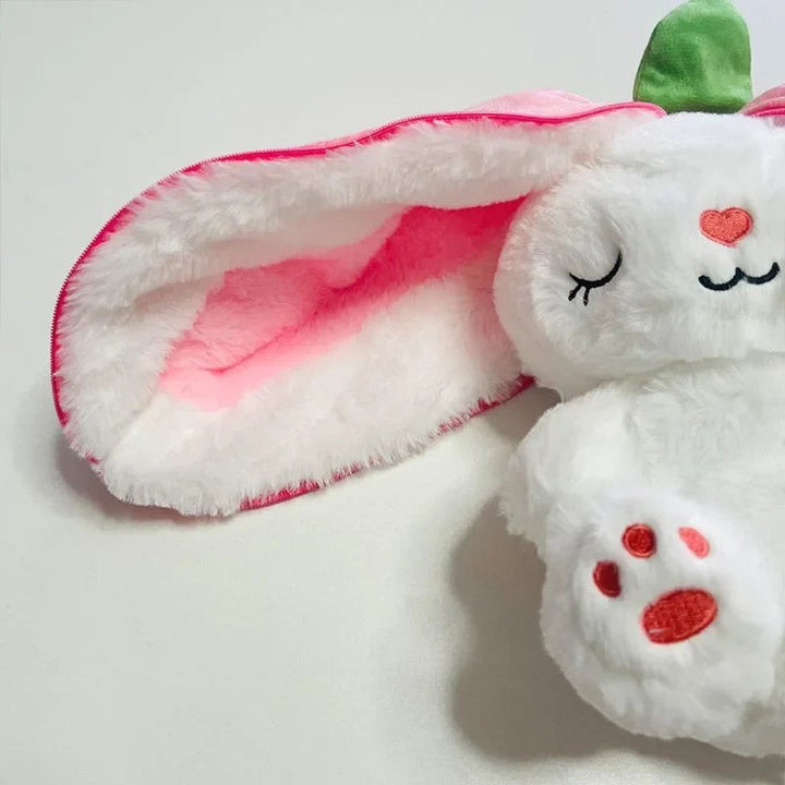 Sea Dragon Dreams white plush bunny doll with pink ear lining, heart nose, and soft fur for soothing sensory play