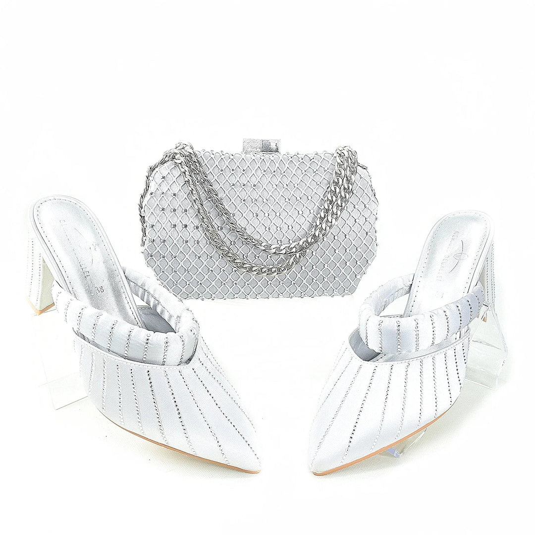 Sea Dragon Dreams white satin high-heel mules with pleated detail and matching mesh chain-strap clutch bag