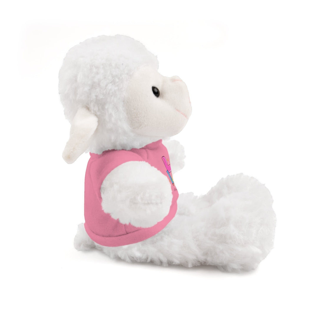 Sea Dragon Dreams white plush sheep stuffed animal wearing a pink cotton t-shirt with Love Teacher Life design