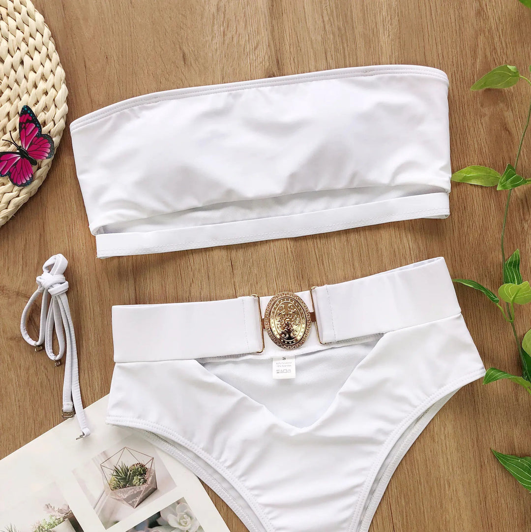 Sea Dragon Dreams white strapless bandeau bikini with a decorative gold metal buckle on the high-waisted bottom.