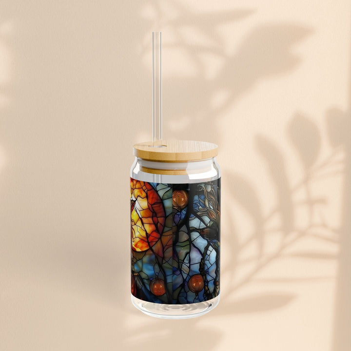 Sea Dragon Dreams 16oz Witches Brew glass sipper with bamboo lid and clear straw against a neutral background.