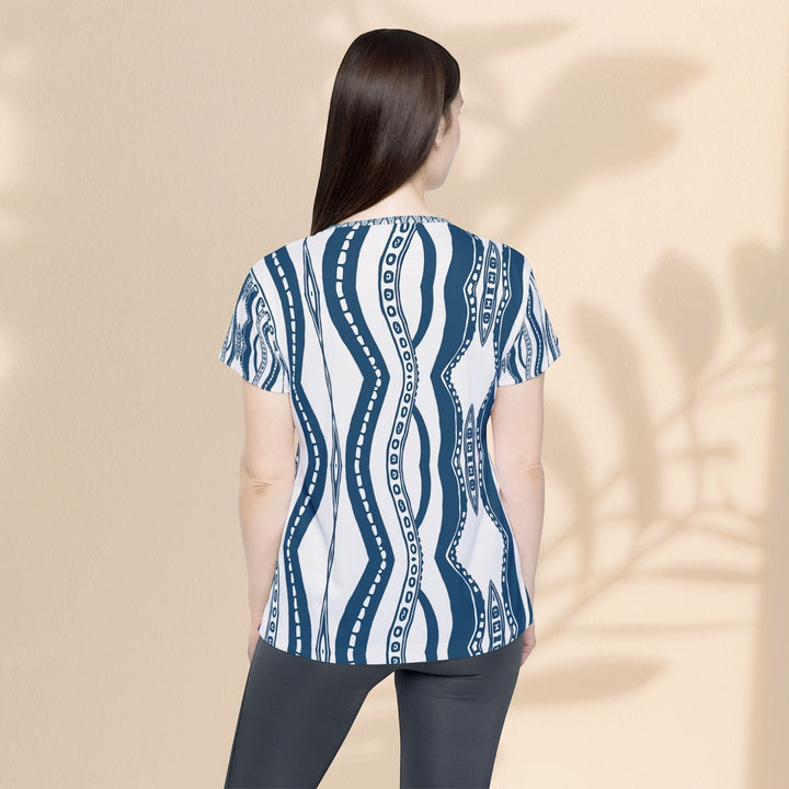 Sea Dragon Dreams women's moisture-wicking sports jersey with a blue and white downward octopus pattern, back view.