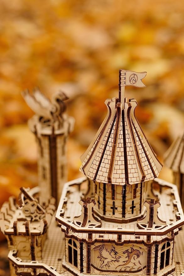 Sea Dragon Dreams Wood Trick 3D wooden dragon castle puzzle with intricate tower details and a flag in autumn setting