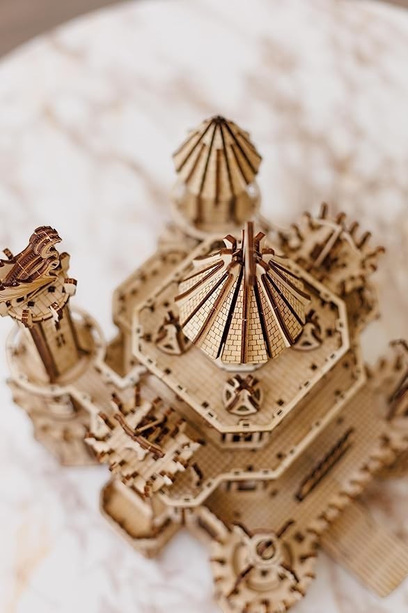 Sea Dragon Dreams Wood Trick Dragon Castle 3D wooden puzzle featuring intricate mechanical towers and dragon details.