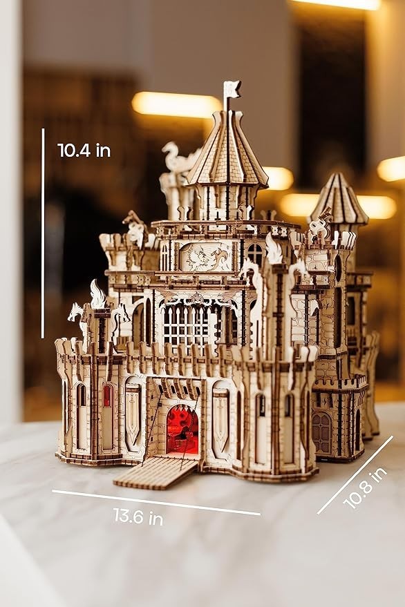 Sea Dragon Dreams Wood Trick 3D wooden dragon castle puzzle with rotating towers and glowing red LED lights.