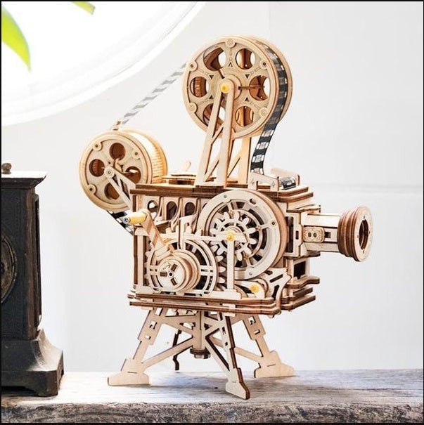 Sea Dragon Dreams wooden film projector 3D puzzle with mechanical gear assembly and hand crank