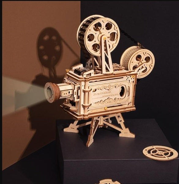 Sea Dragon Dreams wooden mechanical film projector 3D puzzle with hand crank and intricate gear assembly