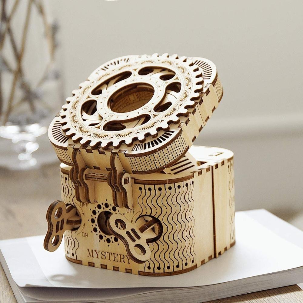 Sea Dragon Dreams wooden mechanical film projector puzzle with intricate gear details and hand crank mechanism