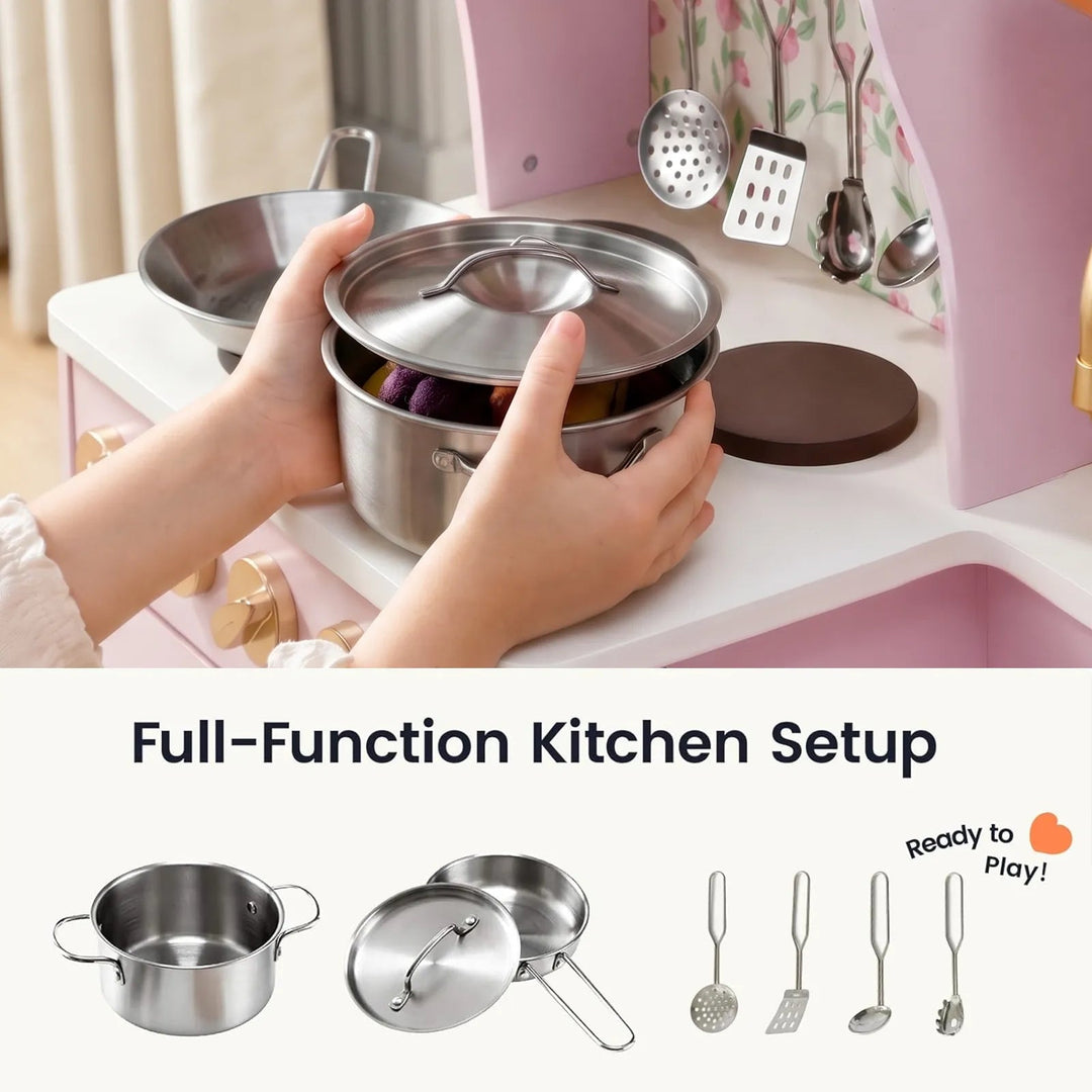 Sea Dragon Dreams Tiny Land wooden play kitchen in Sakura Pink with stainless steel pretend cookware and utensils.