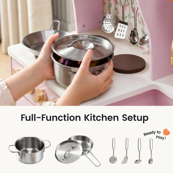 Sea Dragon Dreams Tiny Land wooden play kitchen in Sakura Pink with stainless steel pretend cookware and utensils.