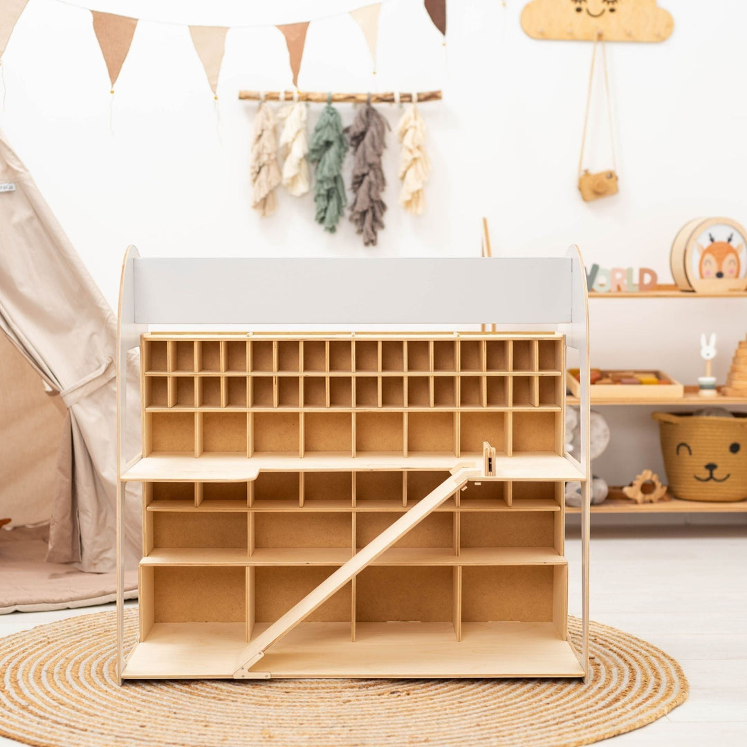 Sea Dragon Dreams wooden toy car garage storage with multiple levels and a ramp in a bright nursery playroom