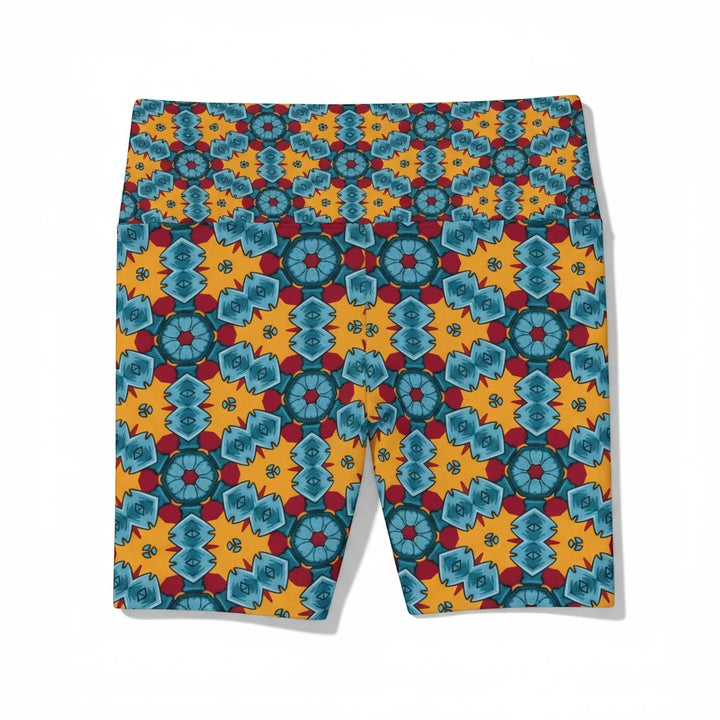 Sea Dragon Dreams workout shorts featuring a vibrant orange, blue, and red geometric dragon-inspired pattern.