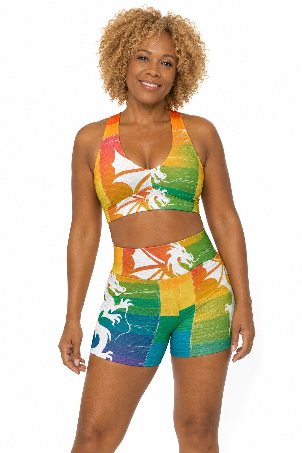 Sea Dragon Dreams women's sports bra and shorts set with yellow striped dragon artwork on a vibrant multi-color pattern