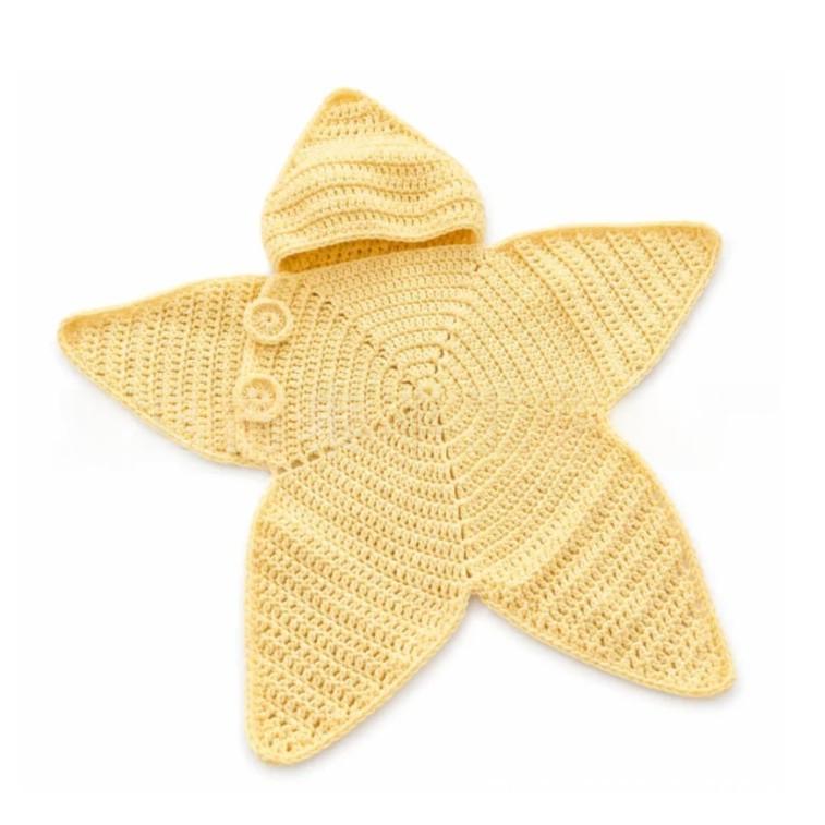 Sea Dragon Dreams yellow crochet starfish baby bunting with a hood, perfect for beach-themed photos and gifts.
