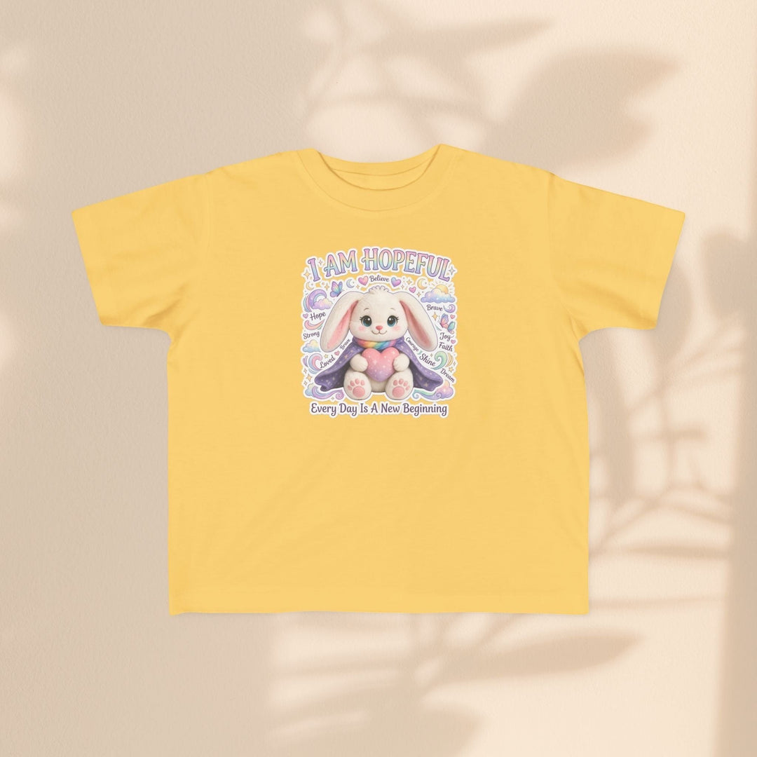 Sea Dragon Dreams yellow toddler tee featuring the Brave Buddies Hope Bunny with the text I Am Hopeful.