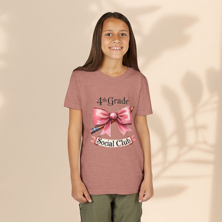 Sea Dragon Dreams youth short sleeve tee in mauve with a 4th Grade Social Club graphic featuring a pink bow and pencil