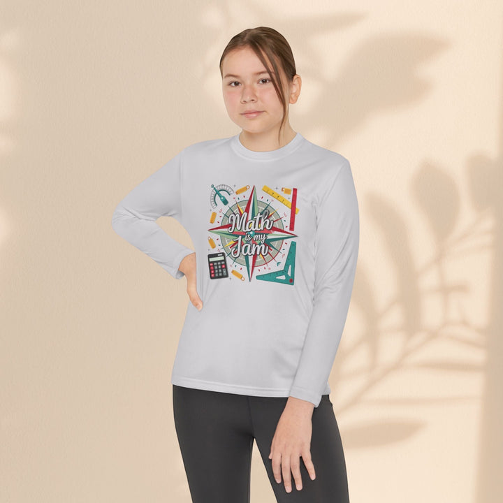 Sea Dragon Dreams youth long sleeve moisture-wicking polyester tee with Math Is My Jam graphic on a young girl.