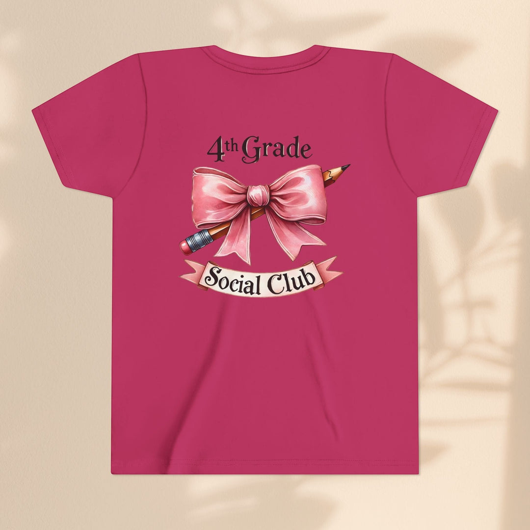 Sea Dragon Dreams youth short sleeve tee in dark pink with 4th Grade Social Club graphic featuring a bow and pencil.