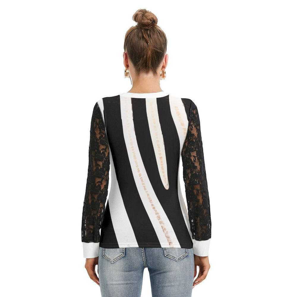 Sea Dragon Dreams women's t-shirt featuring a black and white zebra stripe body and elegant black lace lantern sleeves.