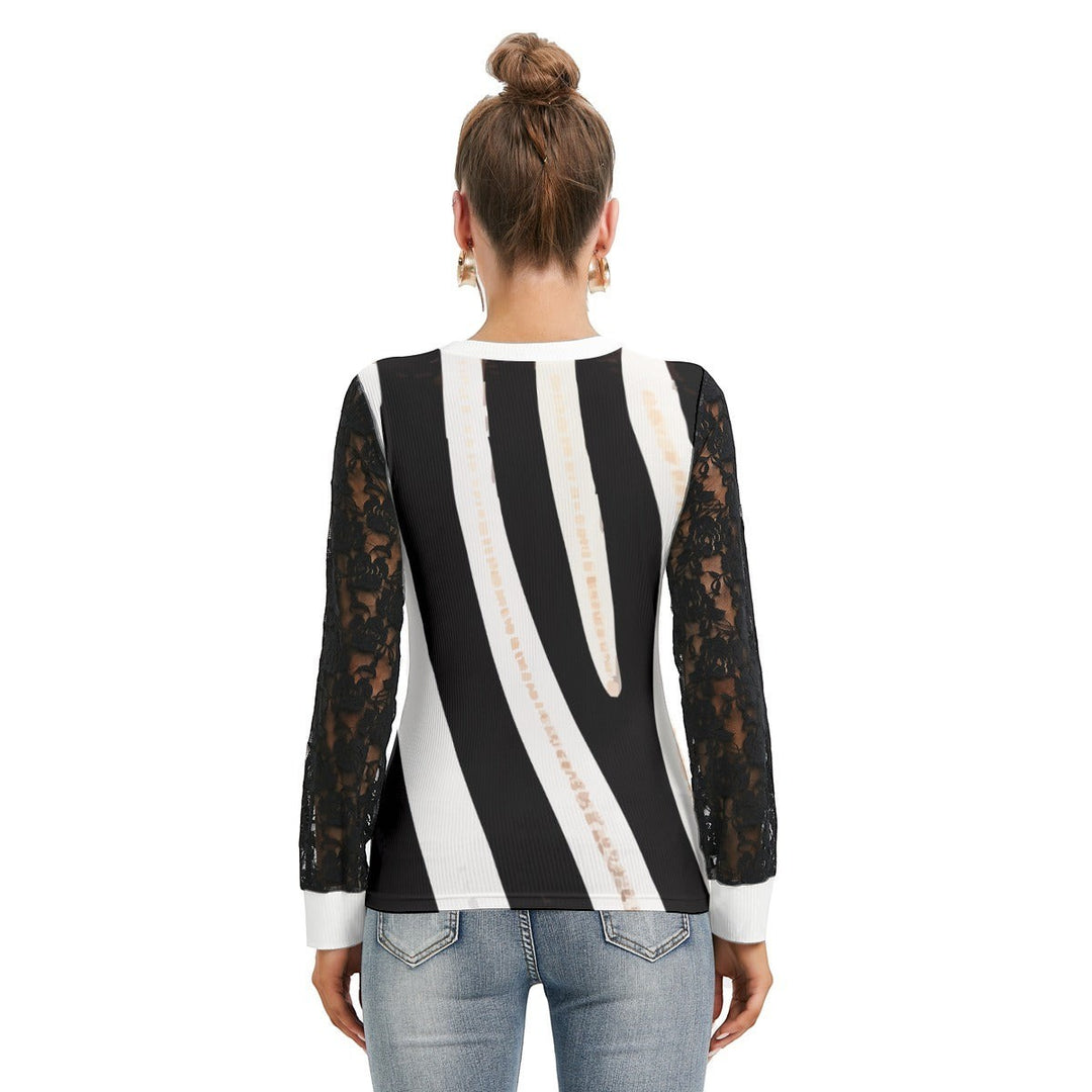 Sea Dragon Dreams women's t-shirt featuring a black and white zebra stripe body and elegant black lace lantern sleeves.