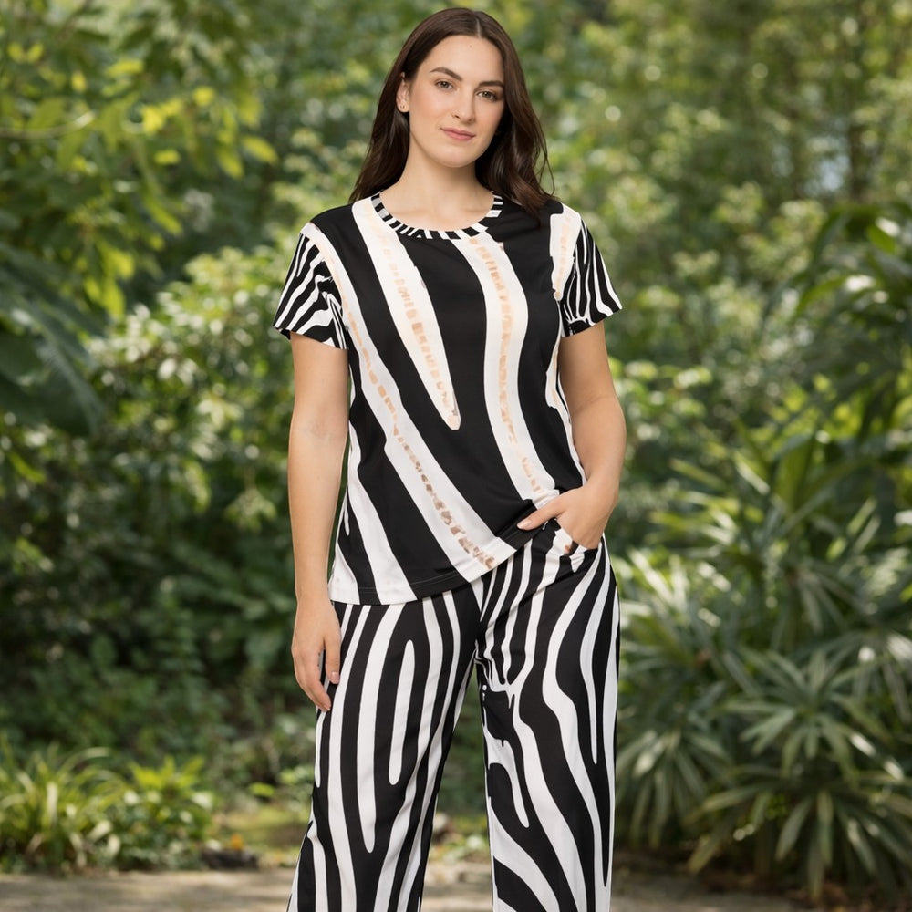Sea Dragon Dreams zebra print workout set featuring a matching short-sleeve top and wide-leg pants in black and white.