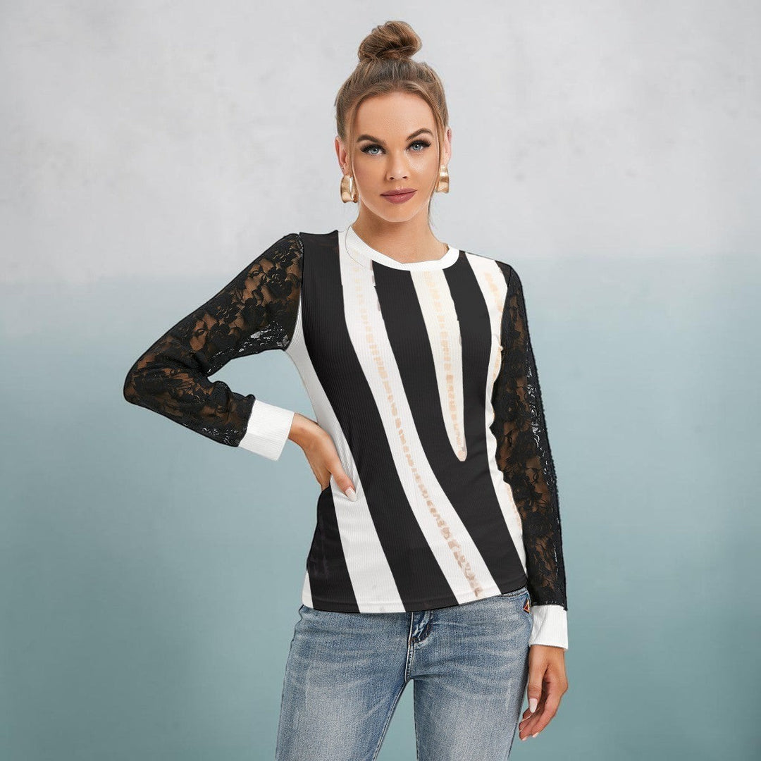 Sea Dragon Dreams women's long-sleeve t-shirt featuring a black and white zebra stripe body and black lace sleeves.